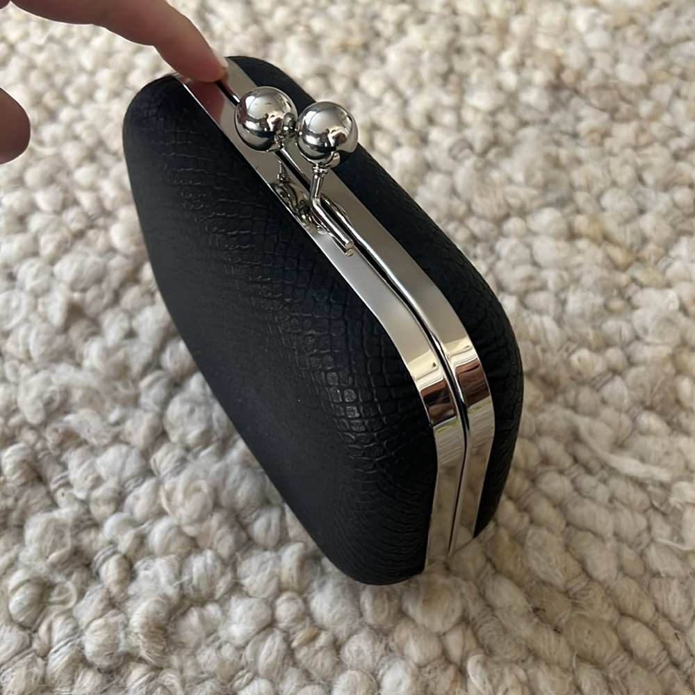 Black leather textured clutch!